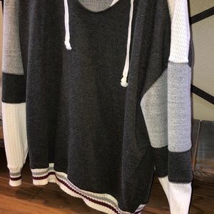 grey and white sweater